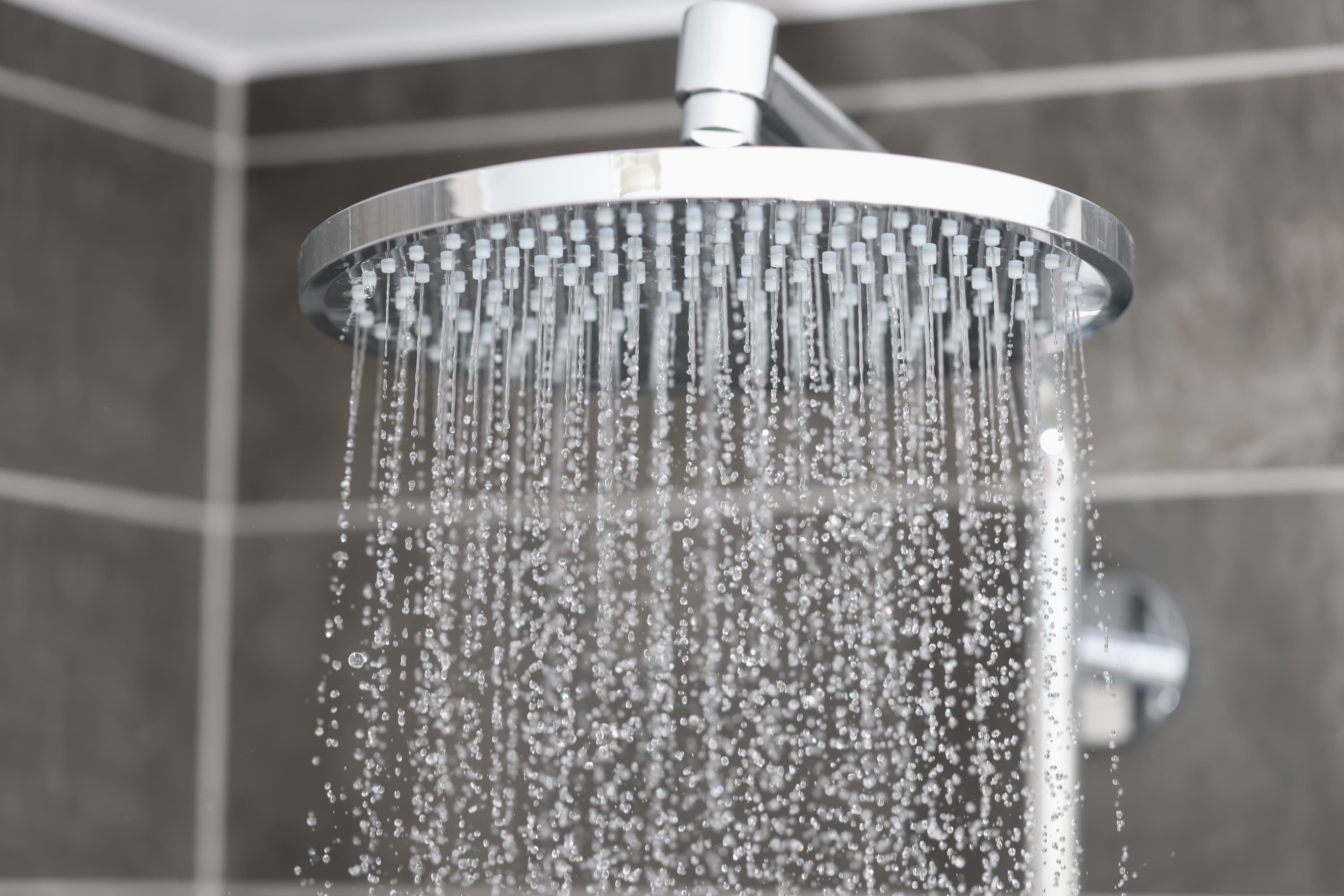 Luxury rain shower with clean soft water in a coastal Wilmington bathroom